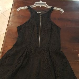 Black lace dress with zipper and pockets